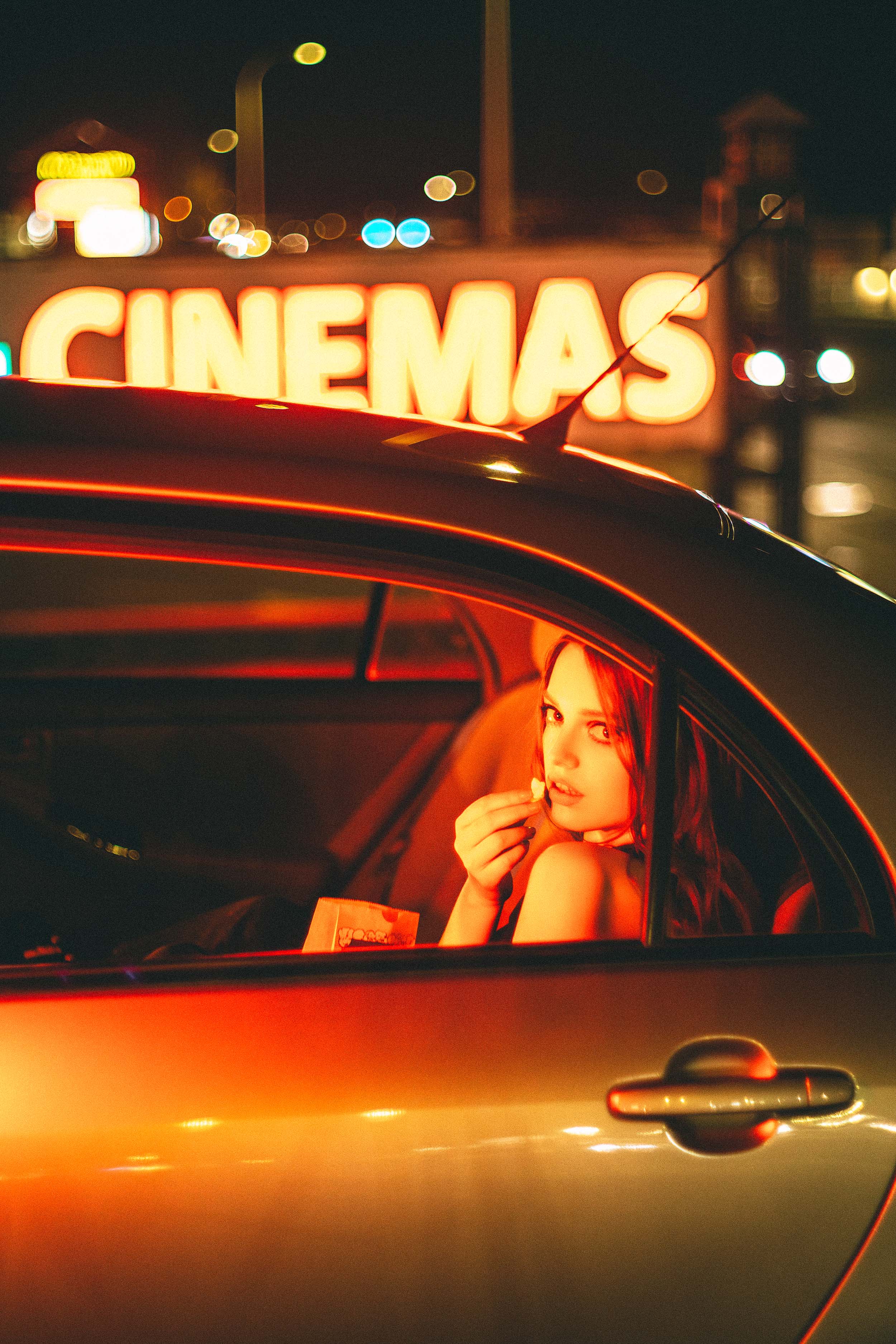 Cinematic Portraits with Vintage Flair by a Movie Theater — photograph 31 of 35